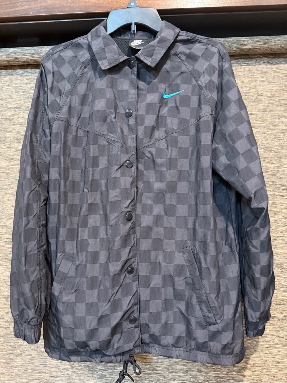 Nike Black Checkered Windbreaker with Teal Swoosh and Cinch Bottom Hemline